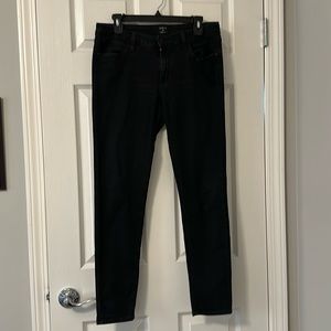 Black skinny jeans with generous stretch
